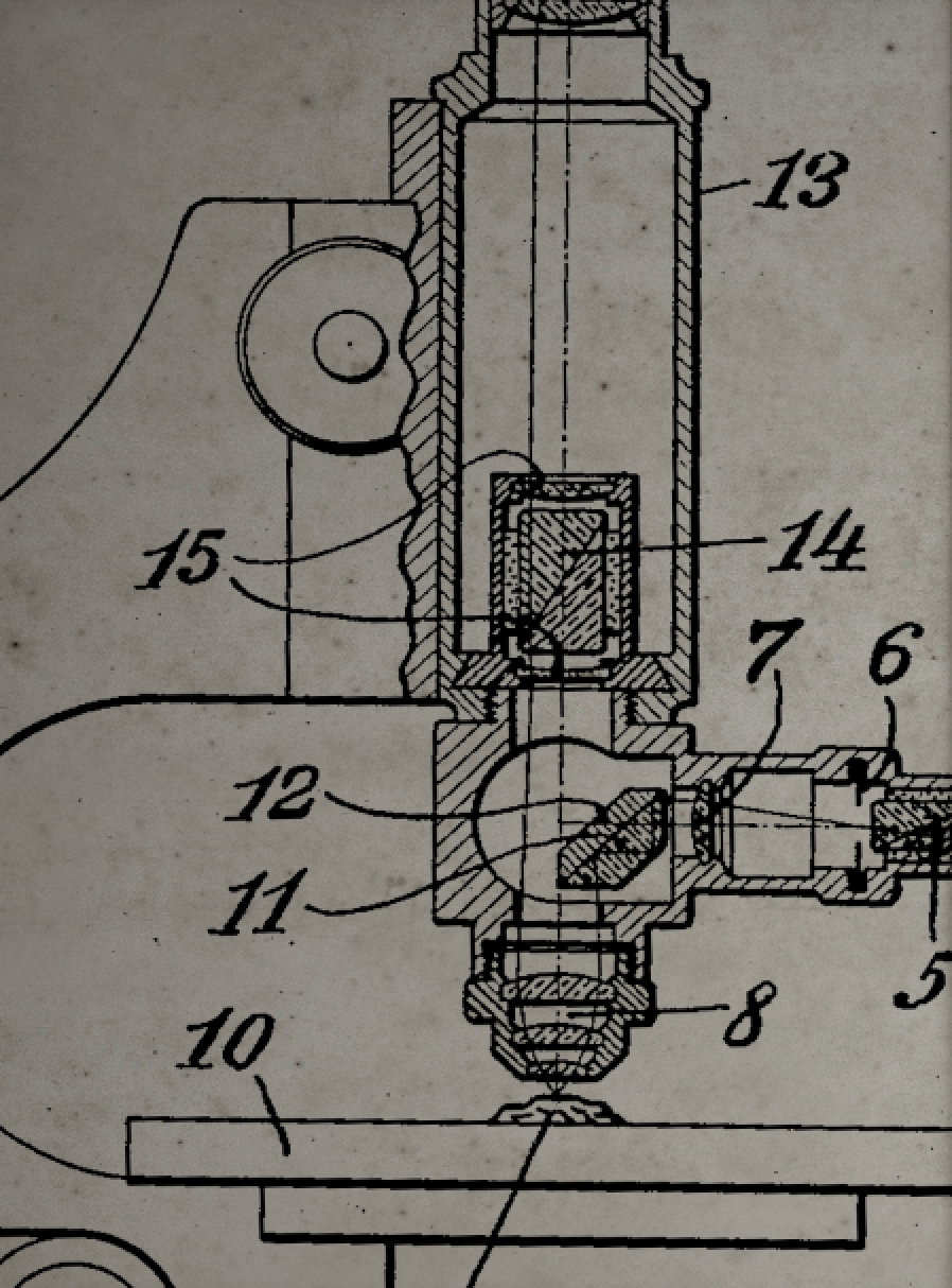 The image is a technical drawing or technical drawing, depicting a part of a machine or device with various labeled parts and components.