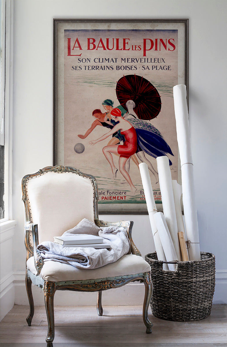 La Baule Les Pins vintage poster wall art on white wall with vintage furniture and vintage decor.