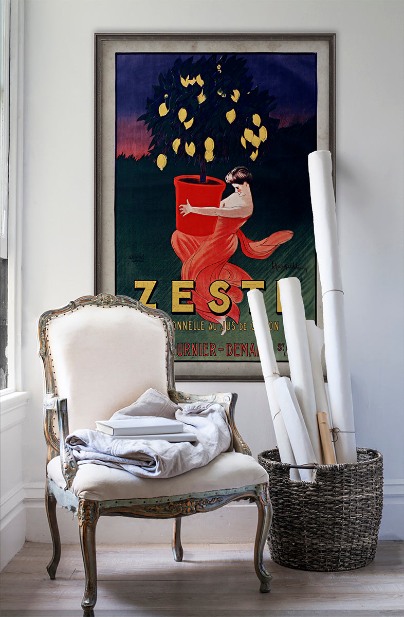 Zeste Citronelle vintage poster wall art on white wall with vintage furniture and vintage decor.
