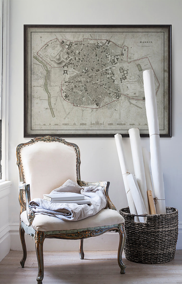 Vintage historic Madrid, Spain map in room with white walls with vintage furniture and vintage decor.