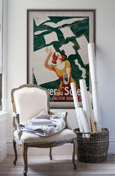 Laver au Soleil  vintage poster wall art on white wall with vintage furniture and vintage decor.