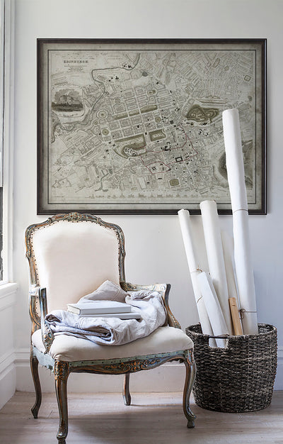 Vintage historic Edinburgh, Scotland map in room with white walls with vintage furniture and vintage decor.