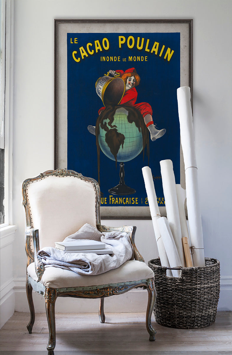 Le Cacao Poulain vintage poster wall art on white wall with vintage furniture and vintage decor.