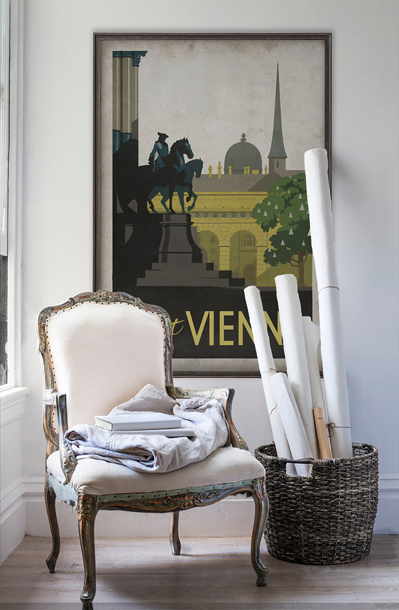 Vienna travel poster wall art on white wall with vintage furniture and vintage decor.