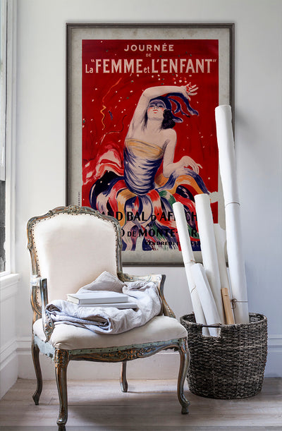 La Femme et L'enfant vintage poster wall art on white wall with vintage furniture and vintage decor.
