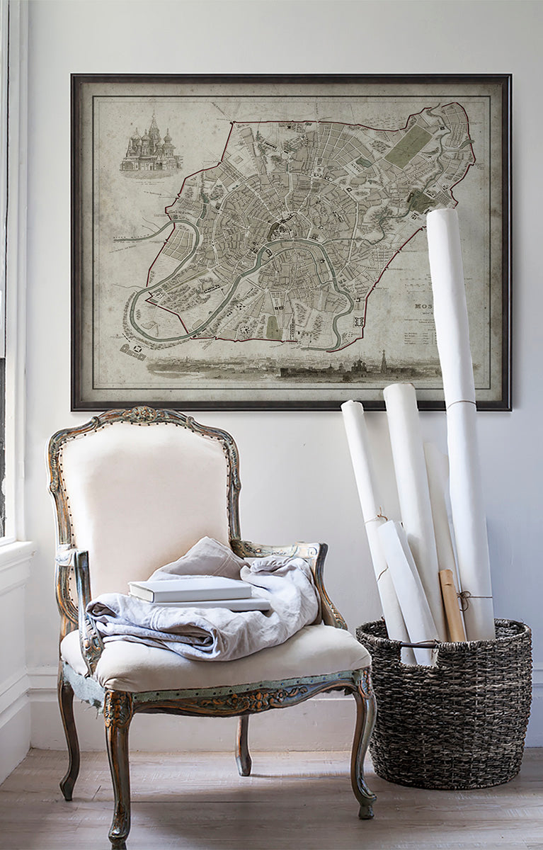 Vintage historic map of Moscow in room with white walls with vintage furniture and vintage decor.