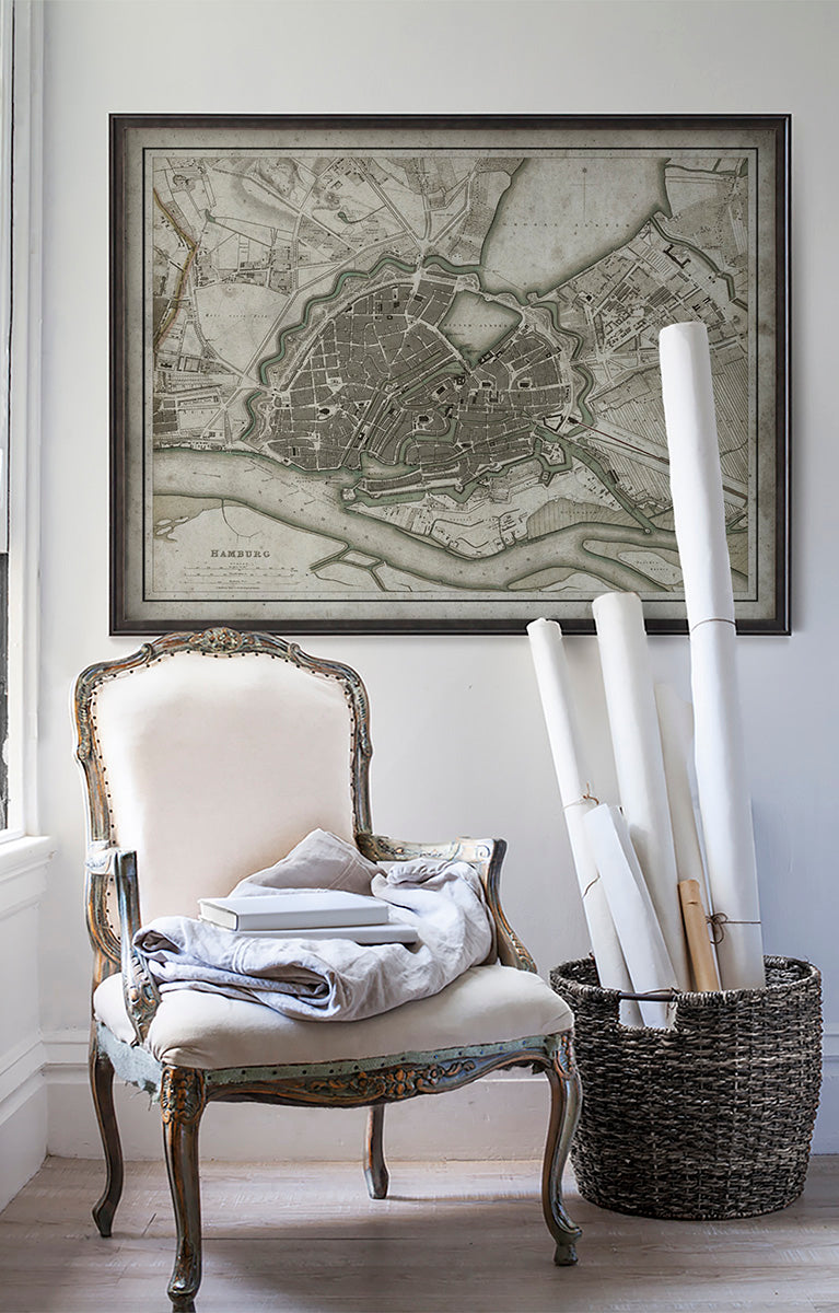 Vintage historic Hamburg, Germany map in room with white walls with vintage furniture and vintage decor.