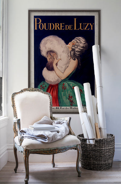 Poudre De Luzy vintage poster wall art on white wall with vintage furniture and vintage decor.