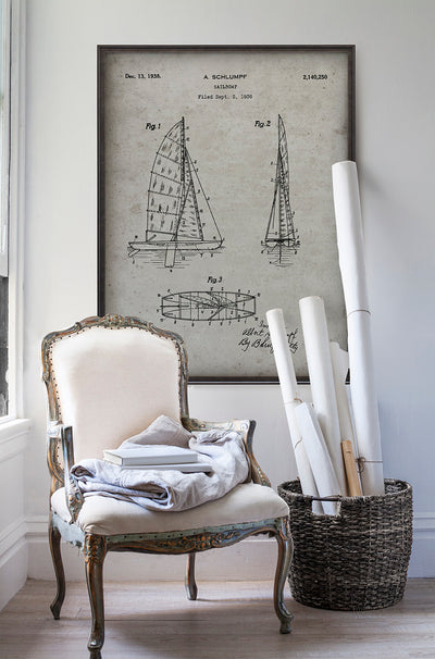 Sailboat Patent A. Schlumpf Patent print art in room with white walls with vintage furniture and vintage decor.